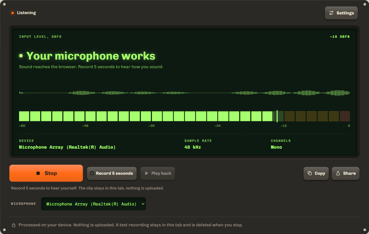 Mic test showing a live waveform, the level bar in the green zone and the line Your microphone works